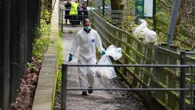 Forensic officers at Kersal Dale, near Salford, where a headless human torso was found. (PA) Forensic officers at Kersal Dale, near Salford, where a headless human torso was found. (PA)