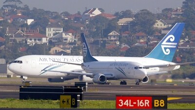 A passenger was caught urinating in a cup during a delay in deplaning. (AP)