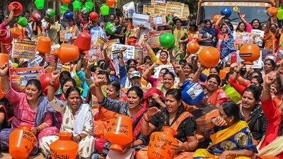 Women protest against the Karnataka government over ongoing water crisis. (PTI) Women protest against the Karnataka government over ongoing water crisis. (PTI)