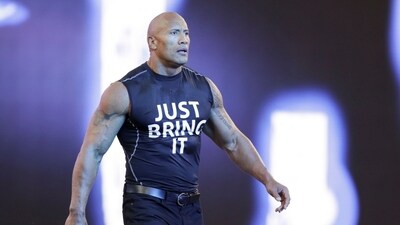 FILE - Dwayne "The Rock" Johnson makes his entrance at Wrestlemania XXXI, Sunday, March 29, 2015, in Santa Clara, Calif. Dwayne “The Rock” Johnson is back to perform in one of the main events this weekend's WrestleMania in Philadelphia. (Don Feria/AP Images for WWE, File) (AP) FILE - Dwayne "The Rock" Johnson makes his entrance at Wrestlemania XXXI, Sunday, March 29, 2015, in Santa Clara, Calif. Dwayne “The Rock” Johnson is back to perform in one of the main events this weekend's WrestleMania in Philadelphia. (Don Feria/AP Images for WWE, File) (AP)
