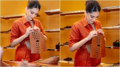 Sonam accessorised the ensemble with deep brown loafers, a tan-coloured leather top handle mini bag, a matching broad waist belt featuring pockets and a metal buckle, and stylish sunnies. For jewellery, she opted for a gold metal bracelet watch, rings, and double-hoop earrings. (Instagram) Sonam accessorised the ensemble with deep brown loafers, a tan-coloured leather top handle mini bag, a matching broad waist belt featuring pockets and a metal buckle, and stylish sunnies. For jewellery, she opted for a gold metal bracelet watch, rings, and double-hoop earrings. (Instagram)