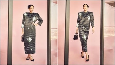 Sonam styled the silk dress with a Lady Dior mini bag, black pumps, rings, diamond ear studs, and a black bow decorated on her centre-parted hairdo. Lastly, she chose mauve eye shadow, winged eyeliner, mascara on the lashes, darkened brows, berry lip shade, and rouge-adorned cheeks. (Instagram) Sonam styled the silk dress with a Lady Dior mini bag, black pumps, rings, diamond ear studs, and a black bow decorated on her centre-parted hairdo. Lastly, she chose mauve eye shadow, winged eyeliner, mascara on the lashes, darkened brows, berry lip shade, and rouge-adorned cheeks. (Instagram)