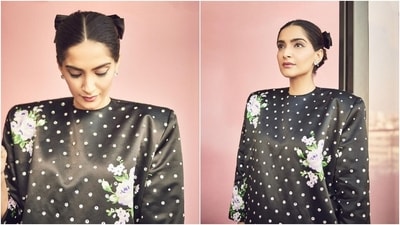 Meanwhile, earlier, Sonam shared another glamorous look on Instagram, dressed in a black printed midi dress. The ensemble is from Richard Quinn. It features box shoulders, a round neckline, a white polka dot pattern embellished with sequins, a floral print, and a relaxed silhouette. (Instagram) Meanwhile, earlier, Sonam shared another glamorous look on Instagram, dressed in a black printed midi dress. The ensemble is from Richard Quinn. It features box shoulders, a round neckline, a white polka dot pattern embellished with sequins, a floral print, and a relaxed silhouette. (Instagram)