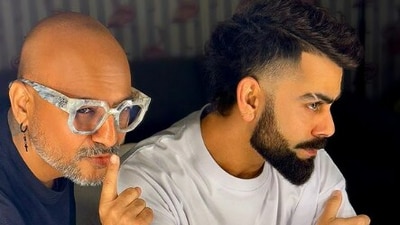 Virat Kohli (R) with Aalim Hakim (Instagram) Virat Kohli (R) with Aalim Hakim (Instagram)