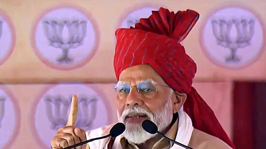 PM Narendra Modi addresses a public meeting in Churu, Rajasthan on Friday (PTI).