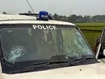 A police vehicle after it was attacked by villagers in Purba Medinipur. (PTI) A police vehicle after it was attacked by villagers in Purba Medinipur. (PTI)