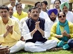 Aam Aadmi Party (AAP) MP Sanjay Singh with his wife Anita Singh, Delhi Minister Saurabh Bhardwaj and party supporters during his visit to Raj Ghat. Aam Aadmi Party (AAP) MP Sanjay Singh with his wife Anita Singh, Delhi Minister Saurabh Bhardwaj and party supporters during his visit to Raj Ghat.