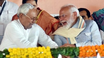 Prime Minister Narendra Modi with Bihar Chief Minister Nitish Kumar during a public meeting ahead of Lok Sabha elections, in Nawada, Bihar