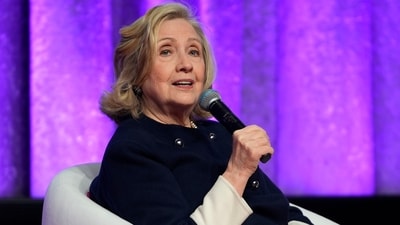 Hillary Clinton returned to her college to accept the honor of having a college building name after her. On campus, demonstrators gathered to intimidate attendees of the women-led democracy event that included Clinton, Fox News reported. (AP) Hillary Clinton returned to her college to accept the honor of having a college building name after her. On campus, demonstrators gathered to intimidate attendees of the women-led democracy event that included Clinton, Fox News reported. (AP)