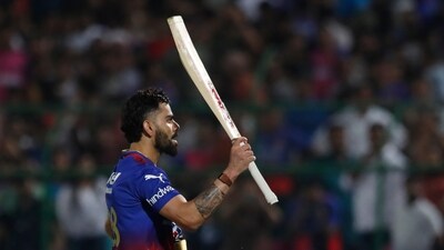 Royal Challengers Bengaluru's Virat Kohli acknowledges the crowd as he walks off the field unbeaten scoring a century at the end of their innings in the Indian Premier League cricket match between Rajasthan Royals and Royal Challengers Bangaluru in Jaipur, India, Saturday, April 6 (AP) Royal Challengers Bengaluru's Virat Kohli acknowledges the crowd as he walks off the field unbeaten scoring a century at the end of their innings in the Indian Premier League cricket match between Rajasthan Royals and Royal Challengers Bangaluru in Jaipur, India, Saturday, April 6 (AP)