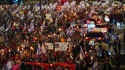 People take part in a protest against Israeli Prime Minister Benjamin Netanyahu's government and call for the release of hostages held in the Gaza Strip by the Hamas militant group. (AP) People take part in a protest against Israeli Prime Minister Benjamin Netanyahu's government and call for the release of hostages held in the Gaza Strip by the Hamas militant group. (AP)