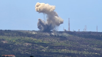 A picture taken from the southern Lebanese village of Alma al-Shaab shows smoke rising from an Israeli outpost (AFP) A picture taken from the southern Lebanese village of Alma al-Shaab shows smoke rising from an Israeli outpost (AFP)