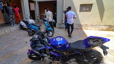 A damaged bike on the Gujarat University hostel campus students hailing from different foreign countries were assaulted allegedly by a group of persons over the issue of offering Namaz, in Ahmedabad (PTI) A damaged bike on the Gujarat University hostel campus students hailing from different foreign countries were assaulted allegedly by a group of persons over the issue of offering Namaz, in Ahmedabad (PTI)