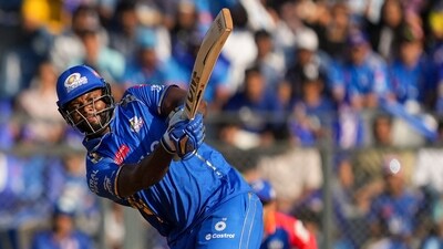 Romario Shepherd smashed 32 runs in Anrich Nortje's final over. He was also named the Player of the Match. (PTI) Romario Shepherd smashed 32 runs in Anrich Nortje's final over. He was also named the Player of the Match. (PTI)