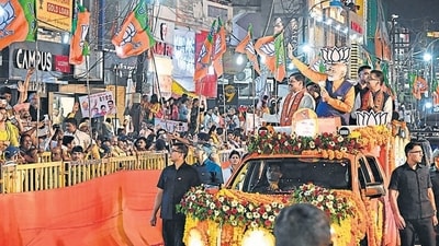 Prime Minister Narendra Modi with Madhya Pradesh Chief Minister Mohan Yadav and BJP candidate Ashish Dubey during a road show ahead of Lok Sabha elections, in Jabalpur, Sunday. (PTI) Prime Minister Narendra Modi with Madhya Pradesh Chief Minister Mohan Yadav and BJP candidate Ashish Dubey during a road show ahead of Lok Sabha elections, in Jabalpur, Sunday. (PTI)