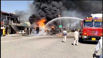 The fire department working to douse the flames after an oil tanker overturned and caught fire at Tahliwal in Una district of Himachal Pradesh on Sunday. (HT Photo) The fire department working to douse the flames after an oil tanker overturned and caught fire at Tahliwal in Una district of Himachal Pradesh on Sunday. (HT Photo)
