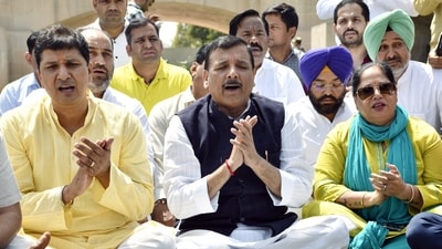Aam Aadmi Party (AAP) MP Sanjay Singh with his wife Anita Singh, Delhi Minister Saurabh Bhardwaj and party supporters during his visit to Raj Ghat. (ANI) Aam Aadmi Party (AAP) MP Sanjay Singh with his wife Anita Singh, Delhi Minister Saurabh Bhardwaj and party supporters during his visit to Raj Ghat. (ANI)