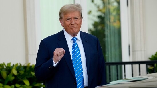 Former President Donald Trump pumps his fist as he arrives for a GOP fundraiser, Saturday, April 6, 2024, in Palm Beach, Fla. (AP Photo/Lynne Sladky) (AP)