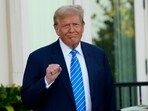 Former President Donald Trump pumps his fist as he arrives for a GOP fundraiser, Saturday, April 6, 2024, in Palm Beach, Fla. (AP Photo/Lynne Sladky)