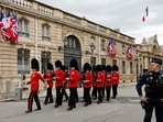 British members of Number 7 Company Coldstream Guards march along the street outside the Elysee Palace, as they make their way into the courtyard, in Paris British members of Number 7 Company Coldstream Guards march along the street outside the Elysee Palace, as they make their way into the courtyard, in Paris