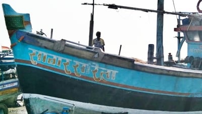 Fishing boat damaged after collision with large ship in deep sea Fishing boat damaged after collision with large ship in deep sea