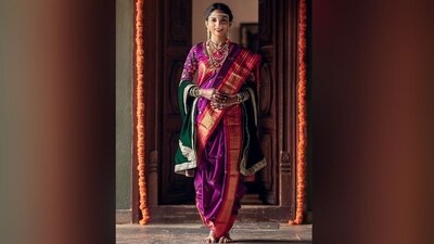 The next best choice for the festival is Nauvari sarees. The unique draping style of the nauvari saree worn by Maharashtrian women allows for easy movement during the festival and keeps your comfort a priority. Complete the look with traditional accessories and a bindi. (Pinterest) The next best choice for the festival is Nauvari sarees. The unique draping style of the nauvari saree worn by Maharashtrian women allows for easy movement during the festival and keeps your comfort a priority. Complete the look with traditional accessories and a bindi. (Pinterest)