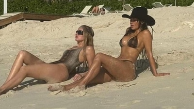 Kim Kardashian enjoyed sunbathing in the beach with sister Khloe Kardashian in a new pic. Kourtney was seen laying down on one of the chairs above. Kim Kardashian enjoyed sunbathing in the beach with sister Khloe Kardashian in a new pic. Kourtney was seen laying down on one of the chairs above. 