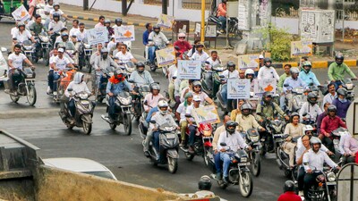 Nagpur Municipal Corporation (NMC) staff participated in a voter awareness rally in Nagpur, Maharashtra. (PTI)