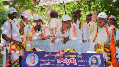 Karnataka Chief Minister Siddaramaiah waves during a roadshow in support of Congress candidate from Bengaluru South constituency Sowmya Reddy in Bengaluru, Karnataka, (Shailendra Bhojak / PTI)