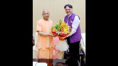 BJP Sarojini Nagar MLA Rajeshwar Singh with chief minister Yogi Adityanath in Lucknow on Monday (HT Photo)