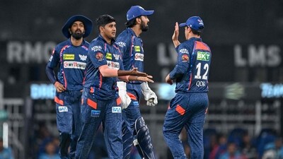 Lucknow Super Giants' Yash Thakur (2L) celebrates with teammates after taking a wicket. (AFP) Lucknow Super Giants' Yash Thakur (2L) celebrates with teammates after taking a wicket. (AFP)