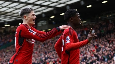 Manchester United's Kobbie Mainoo celebrates scoring their second goal with Alejandro Garnacho. (REUTERS)