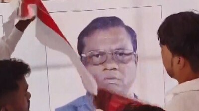 Poster of BJP's Faggan Singh Kulaste being removed (ANI) Poster of BJP's Faggan Singh Kulaste being removed (ANI)