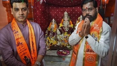 Thane, India - April ,06, 2024:Chief Minister Eknath Shinde with son Shrikant shinde ,in Thane, in Mumbai, India, on, Saturday, April,06, 2024. ( Praful Gangurde / HT Photo )