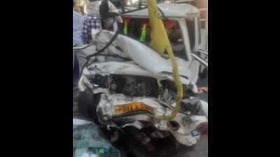 The mangled remains of the pick-up truck that collided with a car on the Kapurthala-Goindwal Sahib road on Sunday night. (HT Photo)