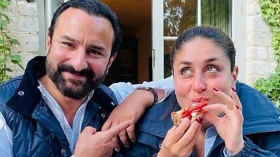 Kareena shared this picture from a vacation to celebrate her wedding anniversary last year. She is seen gorging on a pizza while Saif merrily points at her. Kareena shared this picture from a vacation to celebrate her wedding anniversary last year. She is seen gorging on a pizza while Saif merrily points at her.