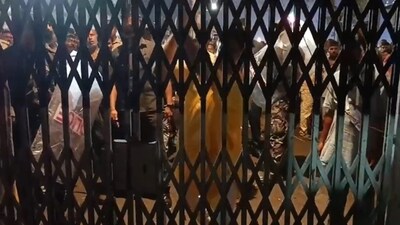 In the purported video, Shantanu Thakur and his supporters were seen breaking the gates of the house where community matriarch Binapani Devi, popularly known as 'Boroma', lived till her death five years back. (TMC/Video grab) In the purported video, Shantanu Thakur and his supporters were seen breaking the gates of the house where community matriarch Binapani Devi, popularly known as 'Boroma', lived till her death five years back. (TMC/Video grab)
