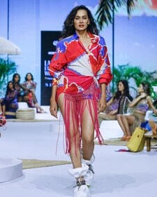 A model wearing a swimwear from Saaksha + Kinni with fringe details A model wearing a swimwear from Saaksha + Kinni with fringe details
