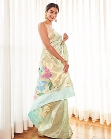 Pooja Hegde wears a pastel blue silk saree with intricate flowers and leaves weaved on the borders and pallu (Photo: Instagram)