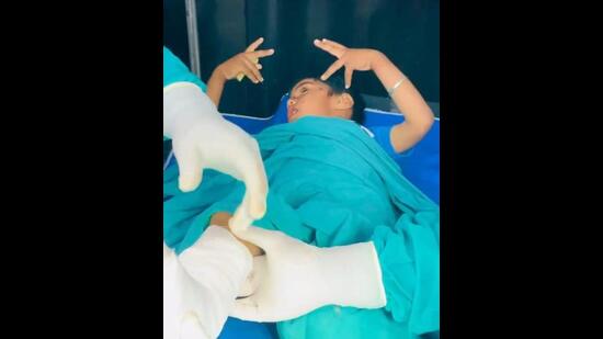 A video grab of Shubhdarshan Singh, 3, trying out a Bhangra move while his right foot is being cast in a plaster under local anaesthesia at a hospital in Jagraon last week.