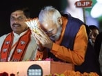 Prime Minister Narendra Modi greets the gathering as he holds a roadshow with Madhya Pradesh chief minister Mohan Yadav in support of BJP ahead of Lok Sabha polls in Jabalpur on Sunday.