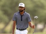 Akshay Bhatia of the United States acknowledges the crowd.