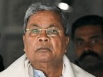 Man with gun goes close to CM Siddaramaiah, garlands him during poll campaign