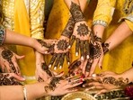 Women deck up in ethnic ensembles and decorate their hands and legs in mehndi to celebrate the special time of the year. (Unsplash)