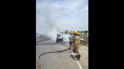 A car catches fire in the middle of a road near Bhuhar Chowki on Tuesday (Sourced)