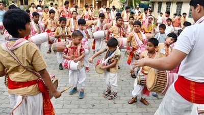 Children wearing traditional attires participate in the 'dhol badan workshop' organised by the Pub Guwahati Bihu Sanmilan ahead of the Rongali Bihu festival, at the AEI Playground, Chandmari, in Guwahati, Assam. (ANI) Children wearing traditional attires participate in the 'dhol badan workshop' organised by the Pub Guwahati Bihu Sanmilan ahead of the Rongali Bihu festival, at the AEI Playground, Chandmari, in Guwahati, Assam. (ANI)