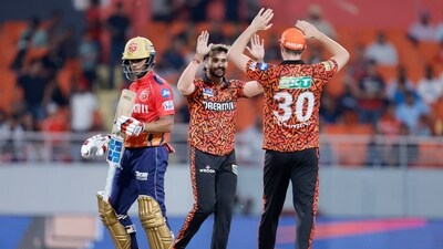 Sunrisers Hyderabad's captain Pat Cummins and teammate Nitish Reddy celebrate the dismissal of Punjab Kings' Jitesh Sharma during their match in the Indian Premier League 2024. (ANI) Sunrisers Hyderabad's captain Pat Cummins and teammate Nitish Reddy celebrate the dismissal of Punjab Kings' Jitesh Sharma during their match in the Indian Premier League 2024. (ANI)