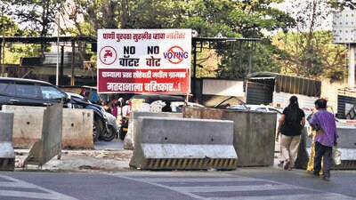 After the residents of Khairewadi slum last week put up banners reading, ‘no water, no vote’, Pune district collector has asked PMC to submit report on the issue. (HT) After the residents of Khairewadi slum last week put up banners reading, ‘no water, no vote’, Pune district collector has asked PMC to submit report on the issue. (HT)