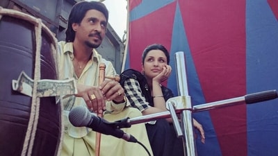 Diljit Dosanjh and Parineeti Chopra in a still from Chamkila. Diljit Dosanjh and Parineeti Chopra in a still from Chamkila.
