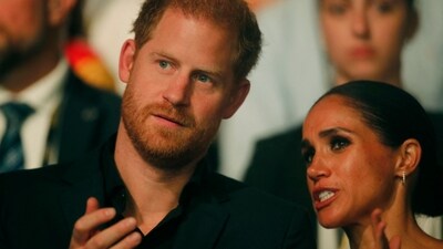 Harry, Duke of Sussex and patron of the Invictus Games (L), and his wife Meghan, Duchess of Sussex, attend the closing ceremony of the 2023 Invictus Games in Duesseldorf, western Germany on September 16, 2023. The Invictus Games, an international sports competition for wounded soldiers founded by British royal Prince Harry in 2014, was taking place from September 9 to 16, 2023 in Duesseldorf. (Photo by LEON KUEGELER / AFP) (AFP) Harry, Duke of Sussex and patron of the Invictus Games (L), and his wife Meghan, Duchess of Sussex, attend the closing ceremony of the 2023 Invictus Games in Duesseldorf, western Germany on September 16, 2023. The Invictus Games, an international sports competition for wounded soldiers founded by British royal Prince Harry in 2014, was taking place from September 9 to 16, 2023 in Duesseldorf. (Photo by LEON KUEGELER / AFP) (AFP)